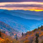Family camping at Jellystone Park™ Cherokee with Smoky Mountain fall colors in September.